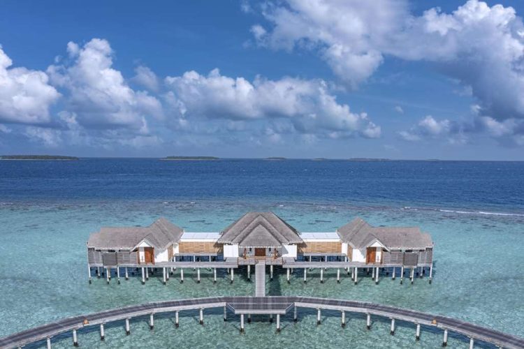 Daylight aerial view of residence and Indian Ocean