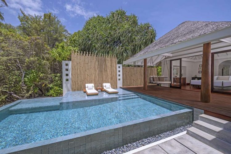 Swimming pool and exterior of 1bedroom familybeach pool villas