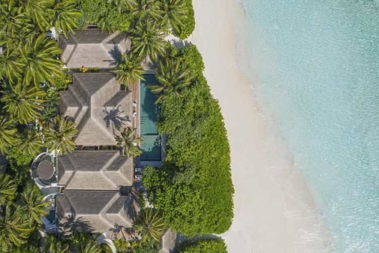 Aerial view of Three Bedroom Beach Pool Residence on beach with swimming pool