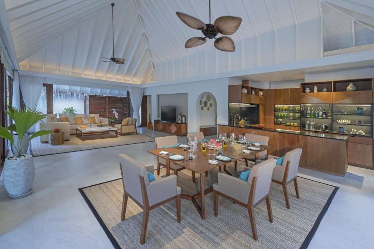 Interior view of dining area, kitchen and lounge in Beach Pool Residence