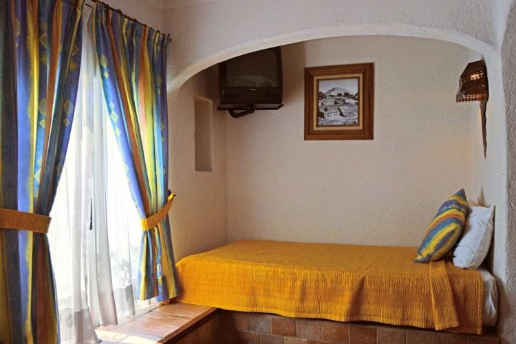 cama individual habitacion estandar hotel villas teotihuacan single bed standard room