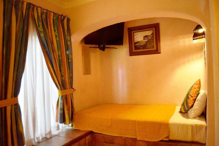 cama sencilla habitacion estandar hotel villas teotihuacan single bed standard room